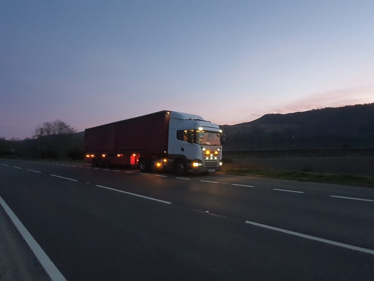 TTM Distribution Trucks/ truck driving on the highway